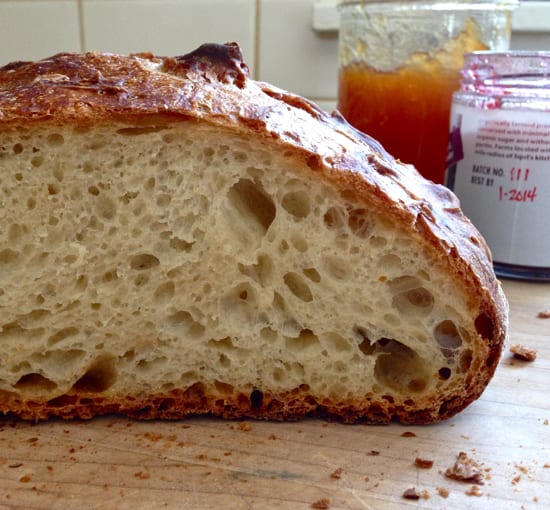 A loaf of no-knead bread cut in half