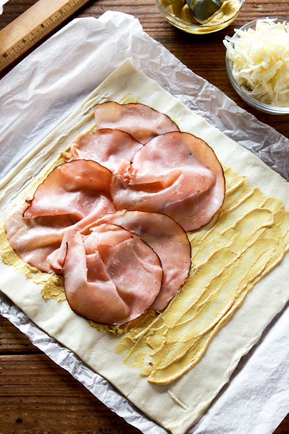 Puff pastry layered with Dijon mustard and ham.