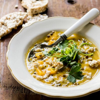 thai pumpkin soup with tangled scallions + crispy rice cake croutons
