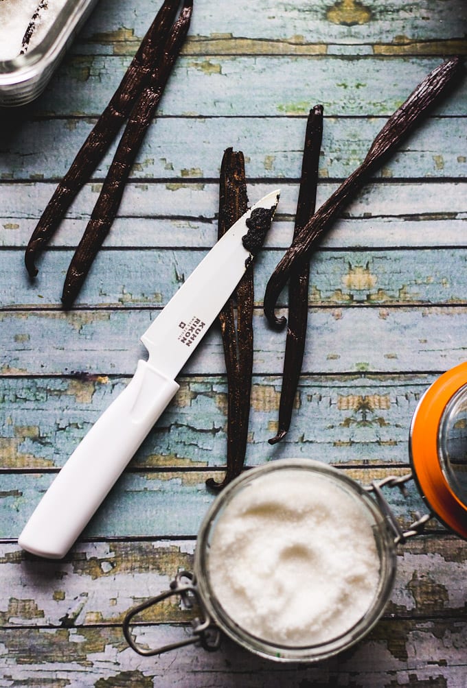 Vanilla beans with sugar and a white paring knife | theclevercarrot.com
