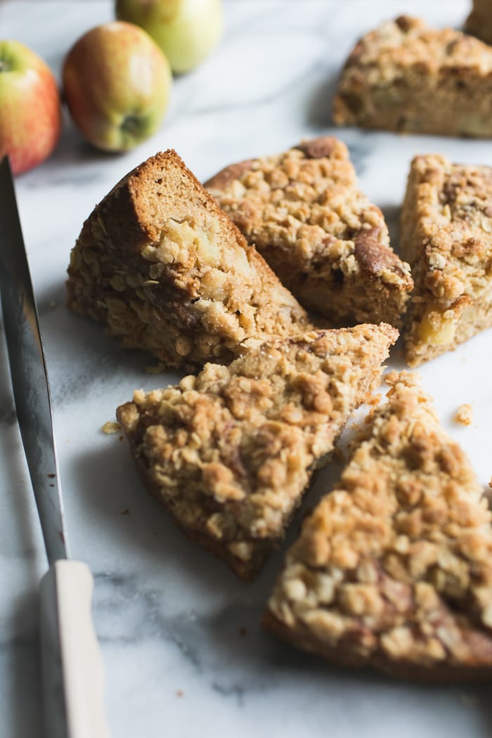 Wedge of fresh apple crumble cake with a crumble topping