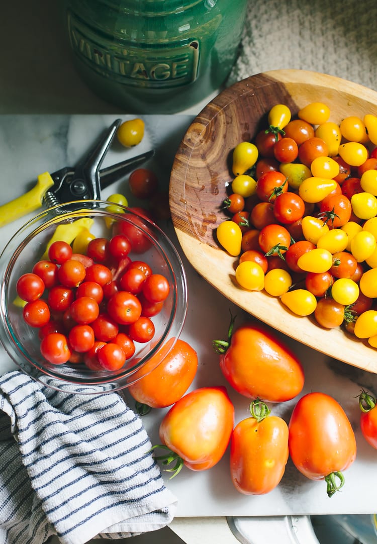 Fresh tomatoes in a wooden bowl