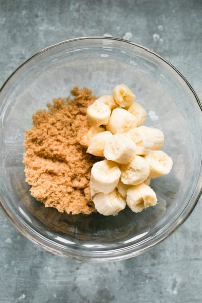Brown sugar and bananas in a large mixing bowl