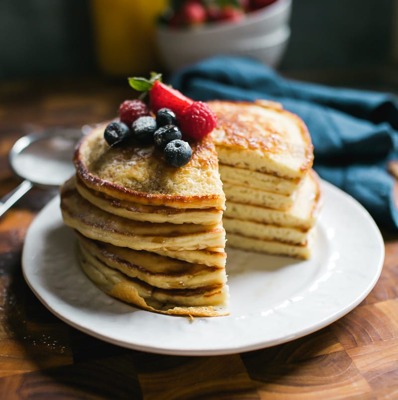 Stack of Sourdough Pancakes with Berries | theclevercarrot.com