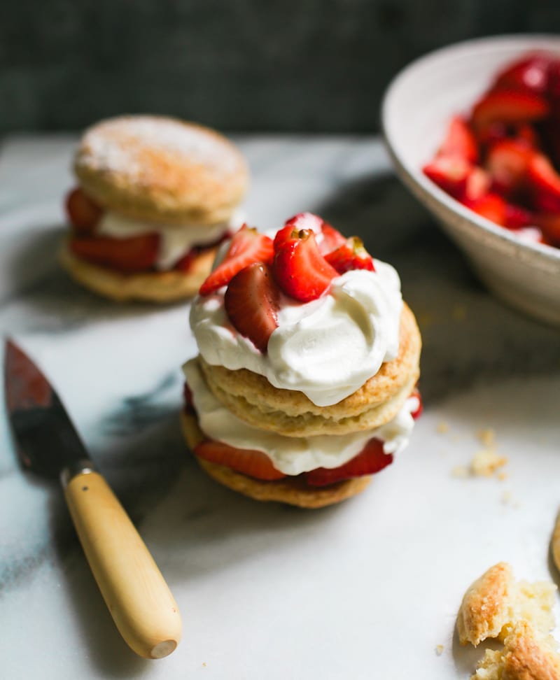 Strawberry shortcakes with whipped cream and berries