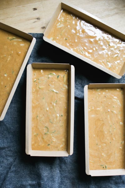 Sourdough zucchini bread batter in 4x mini moaf pans