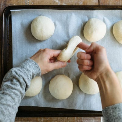 Stretching and shaping sourdough bagel dough