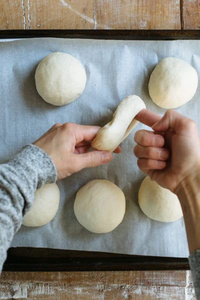 Stretching and shaping sourdough bagel dough