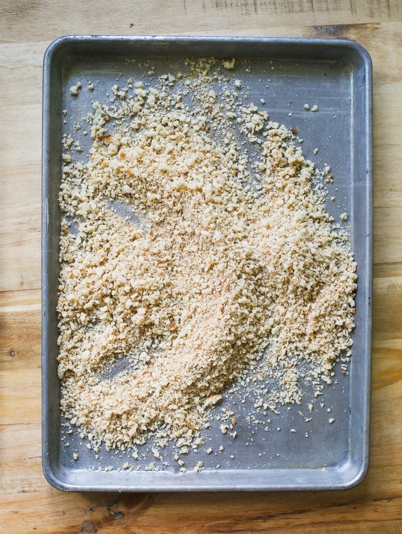 Homemade sourdough breadcrumbs on a sheetpan