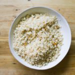 A white bowl of chunky homemade breadcrumbs