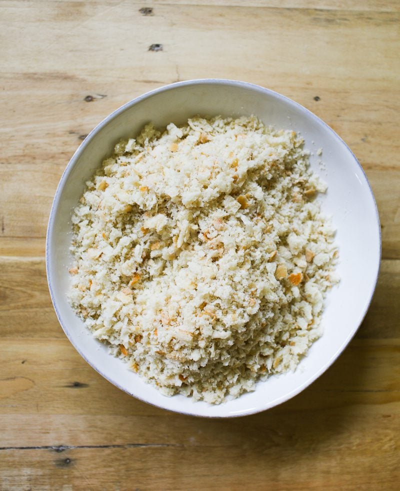 A white bowl of chunky homemade breadcrumbs