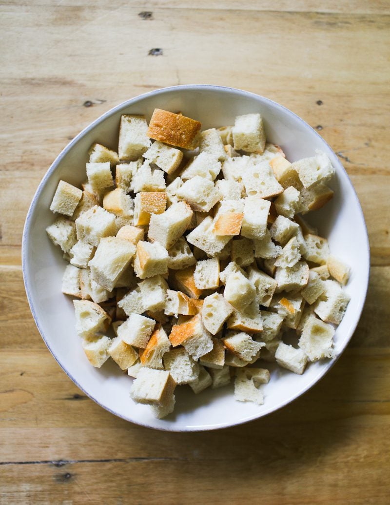 White bowl of cubed bread