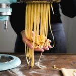 Long homemade fettuccini pasta noodles