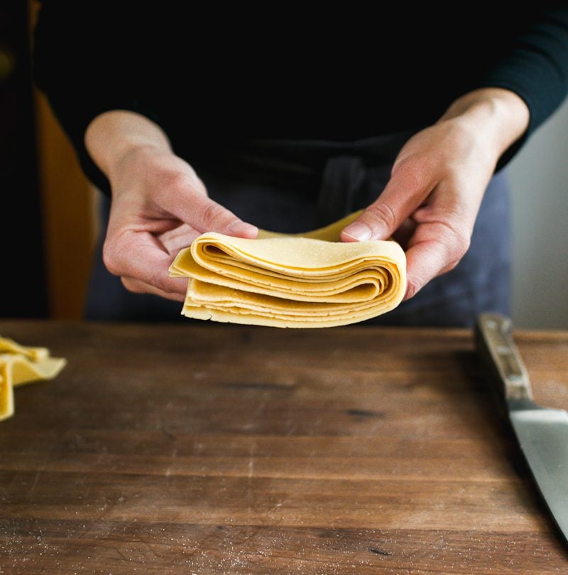 Stack of homemade fresh pasta sheets