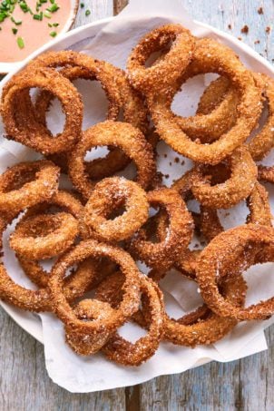 Large bowl of super crispy sourdough onion rings