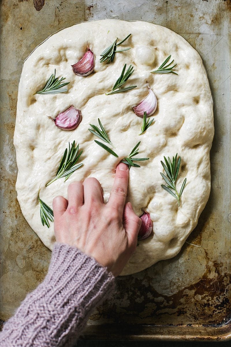 Sourdough focaccia dough with rosemary and garlic