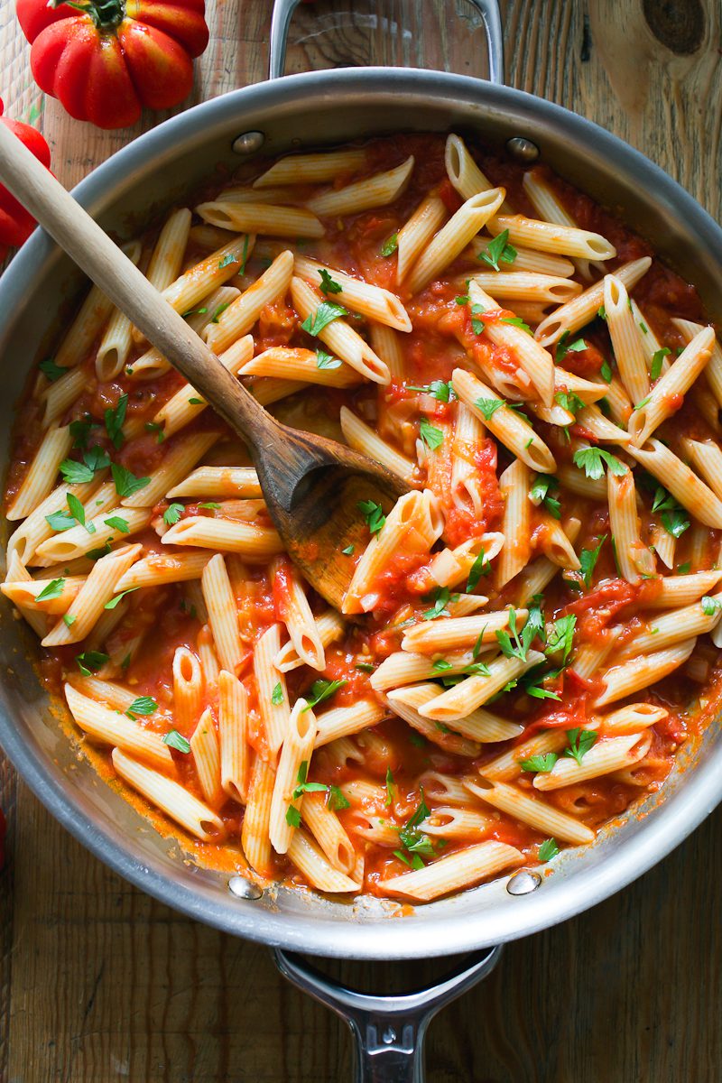 Arrabbiata sauce with penne pasta in a skillet