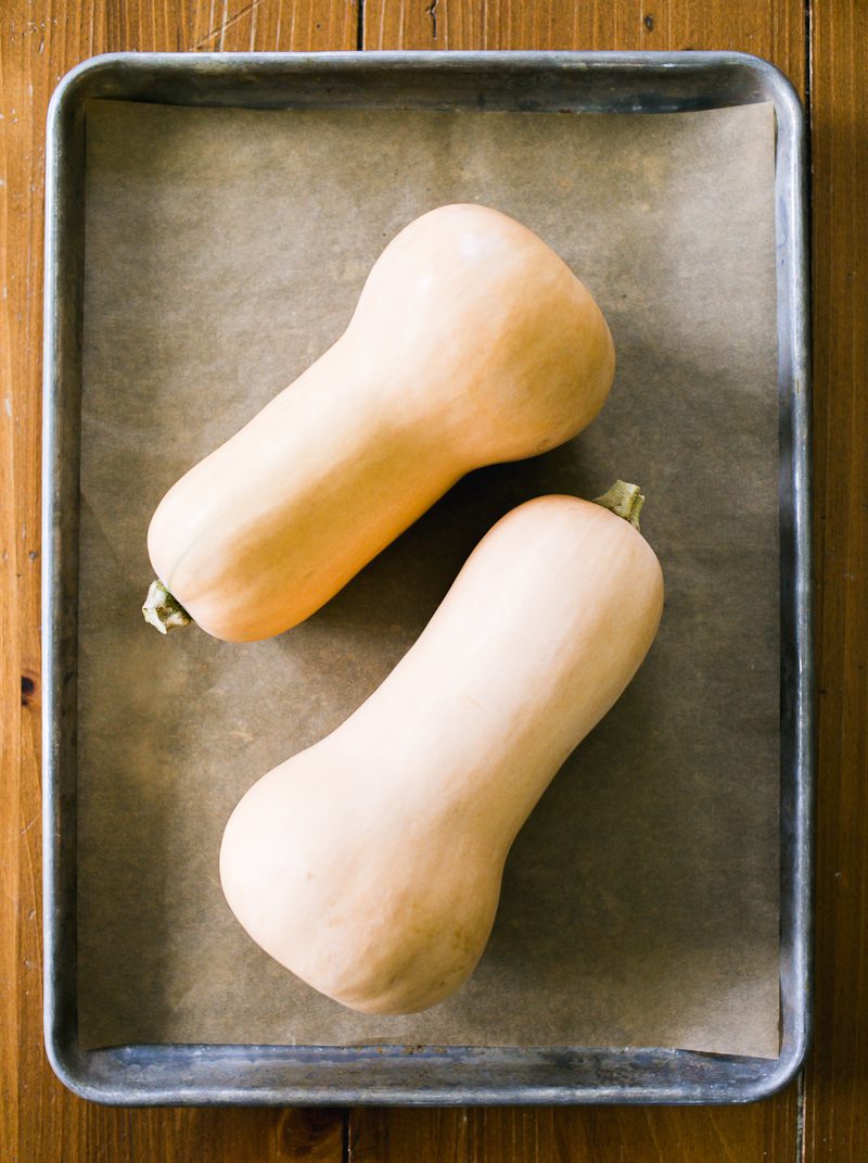 Butternut squash on a parchment-lined sheet pan