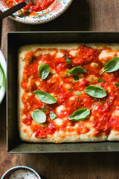 Par-baked sourdough pizza crust with no-cook pizza sauce and fresh basil