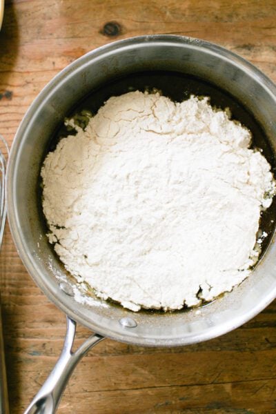 Flour added to pot with molasses mixture