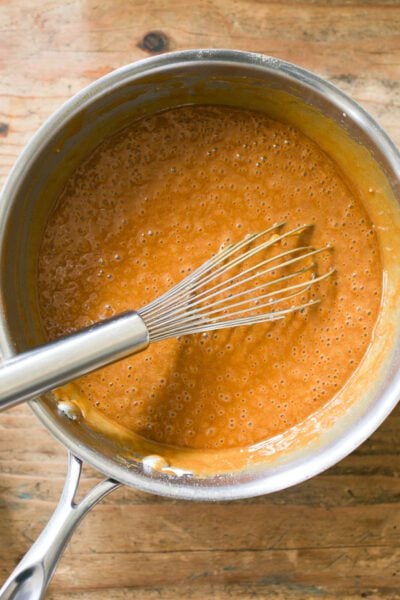 Mixed sourdough gingerbread batter in a pot