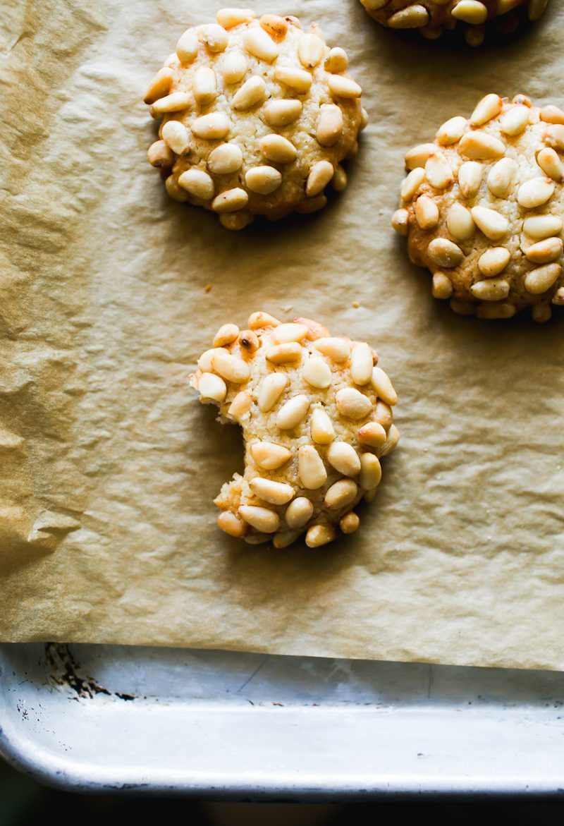 Pignoli cookie (Italian pine nut cookie) on a parchment-lined baking sheet
