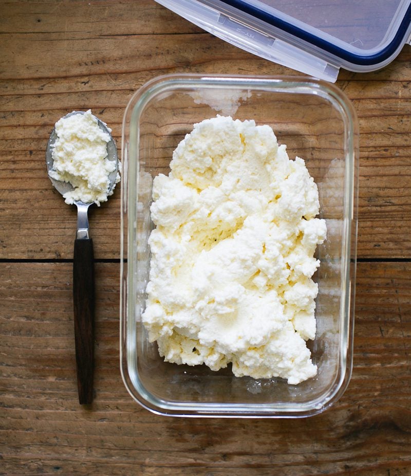 Homemade ricotta in an air-tight storage container