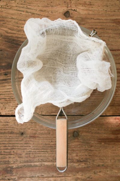 Cheesecloth lined strainer