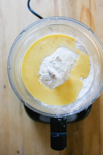 Flour and eggs in food processor