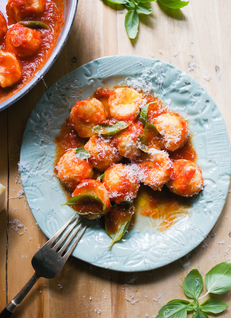 Homemade ricotta gnocchi with pomodoro sauce, basil and Parmesan cheese