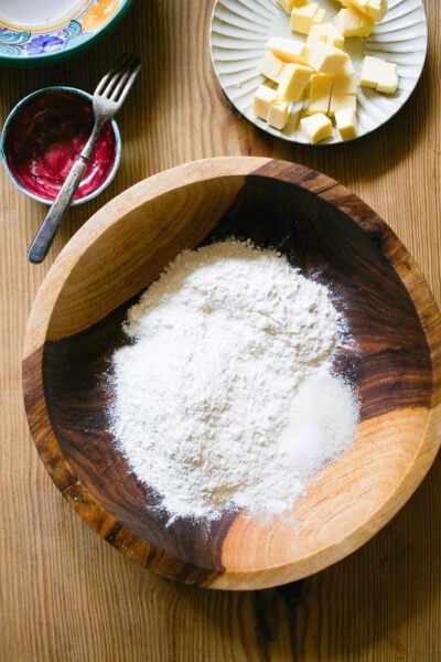 Flour, sugar and salt in a wood bowl