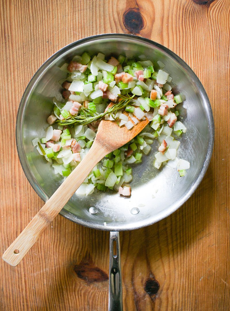 Diced bacon, onions, celery, garlic and rosemary in a skillet cooked for 10 minutes.