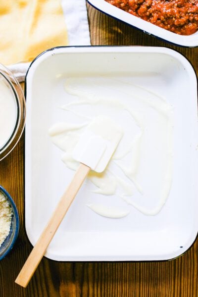 Coated 9x13-inch pan with béchamel sauce