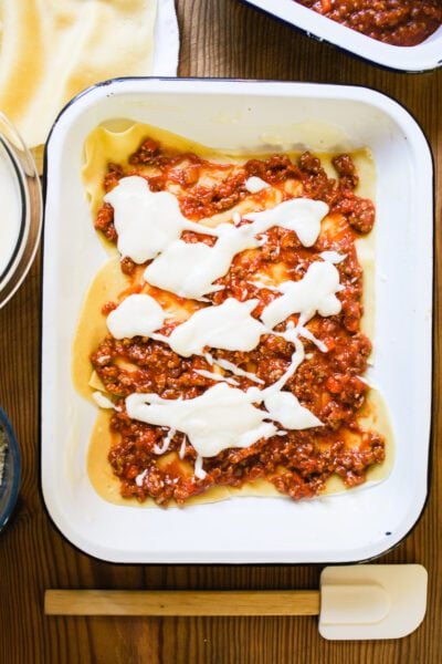 One layer of lasagna noodles w/ ragù sauce and béchamel sauce