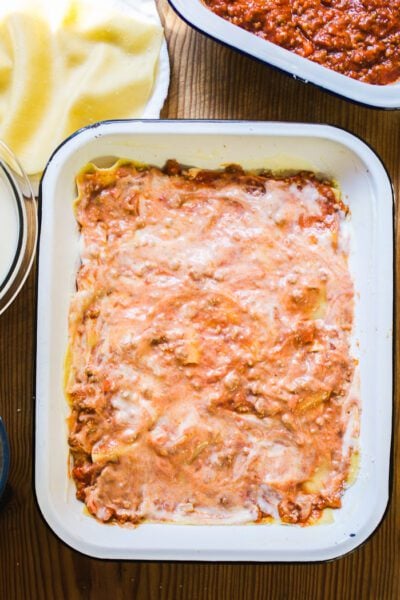 Layer of lasagna noodles w/ ragù Bolognese sauce & béchamel sauce mixed together