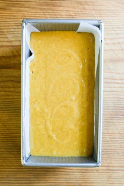 Sourdough pumpkin bread batter in a loaf pan (unbaked)