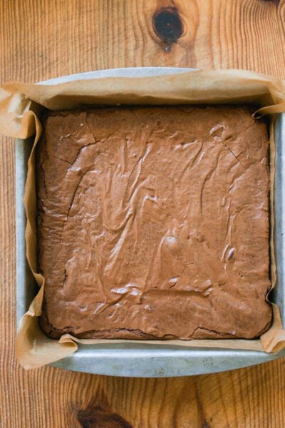 Baked sourdough brownies in a lined pan