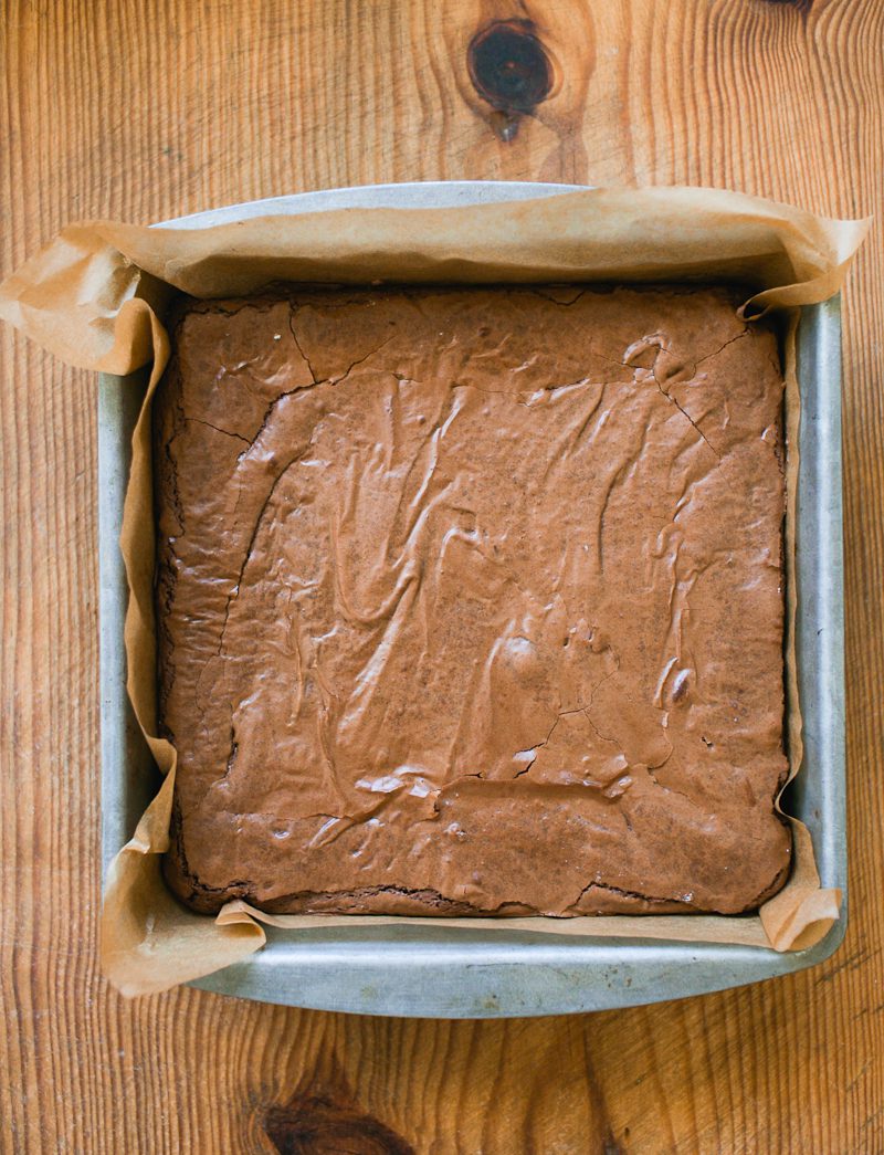 Baked sourdough brownies in a lined pan