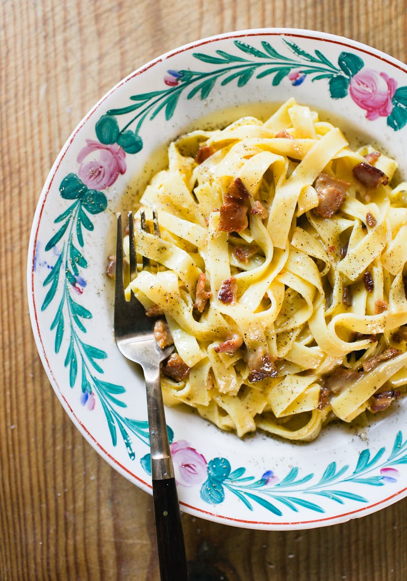 Creamy, homemade pasta carbonara in a shallow bowl