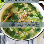 Big pot of Italian wedding soup with tiny chicken meatballs