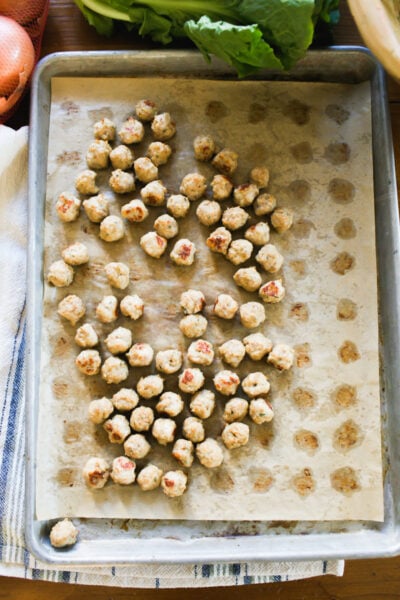 Baked chicken meatballs on a sheet pan
