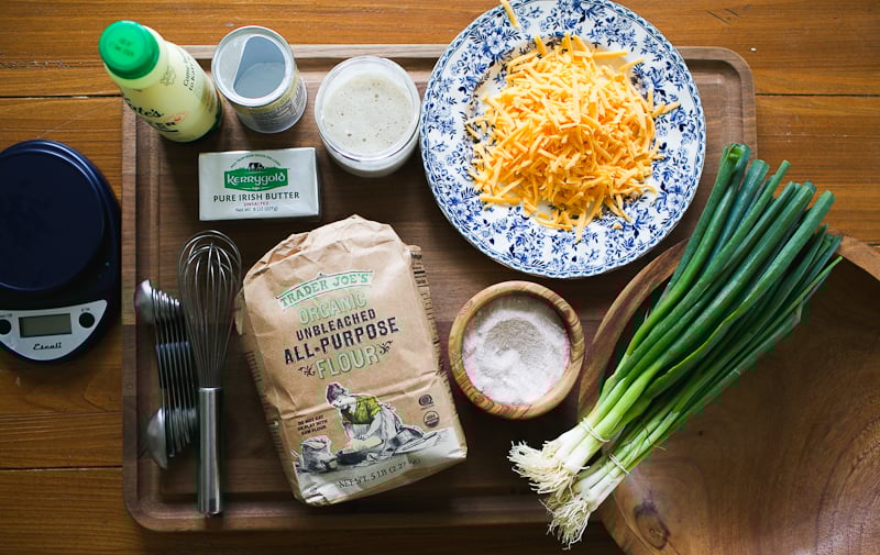 Sourdough discard biscuit ingredients on a wooden cutting board