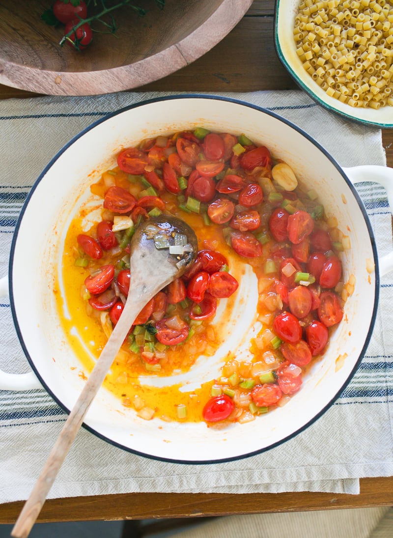 Softened, cooked tomatoes in a soup pot