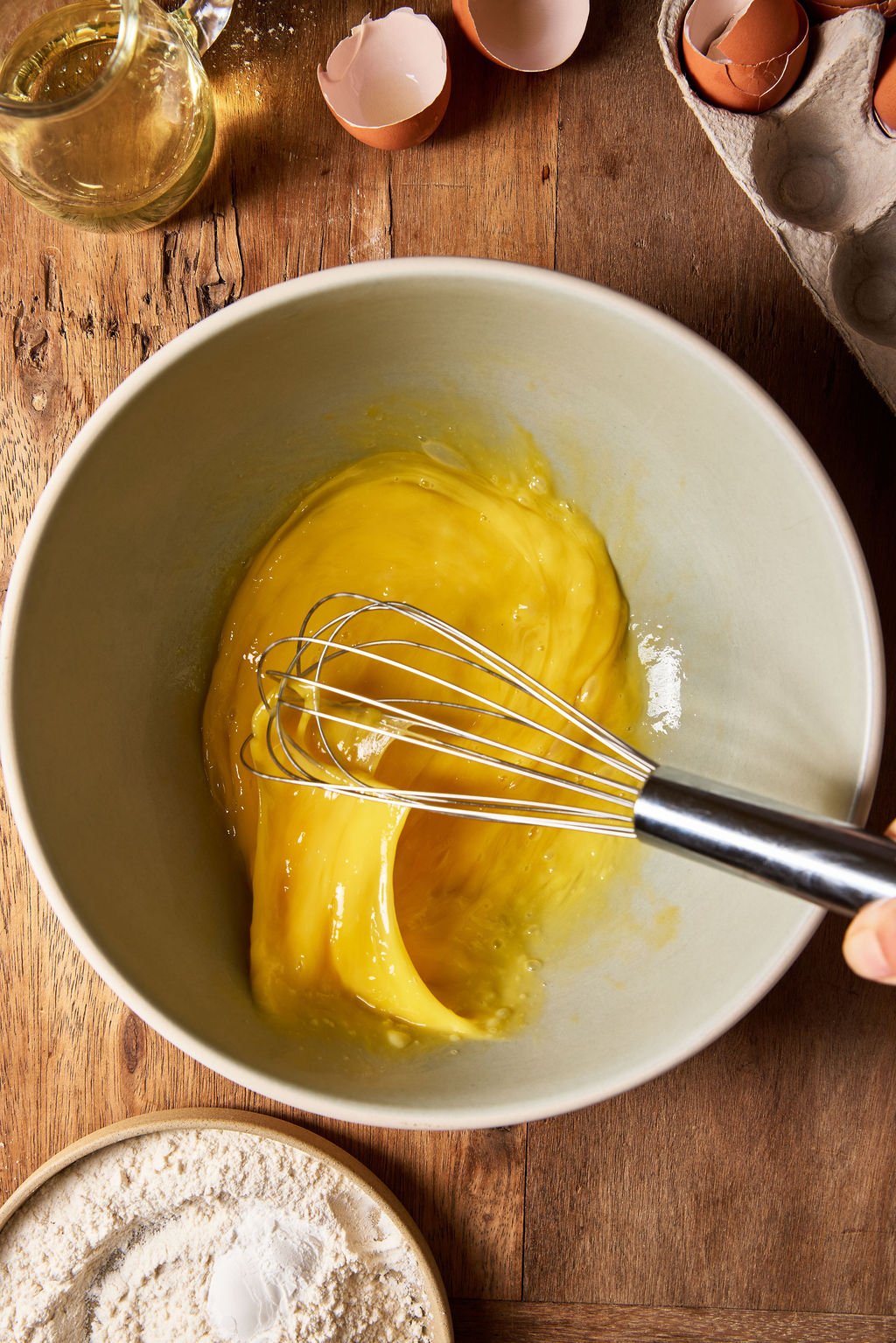 Whisked eggs in a mixing bowl