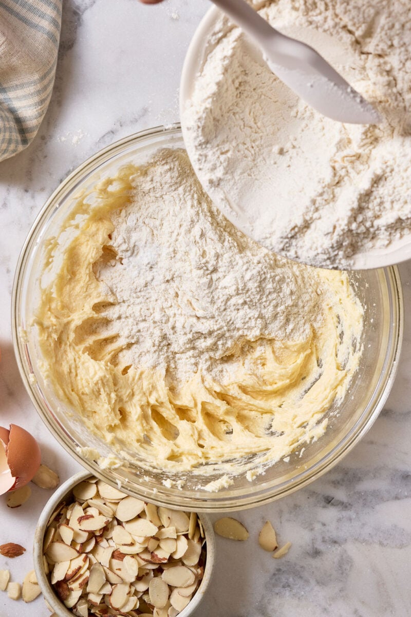 Dry ingredients being added to the wet ingredient mixture.