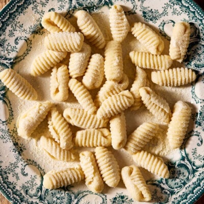 Sourdough cavatelli, homemade, on a vintage blue and white plate.