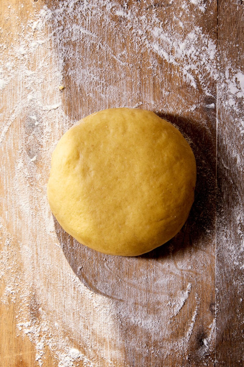 Ball of sourdough tortellini pasta dough, soft, supply and hand-kneaded.