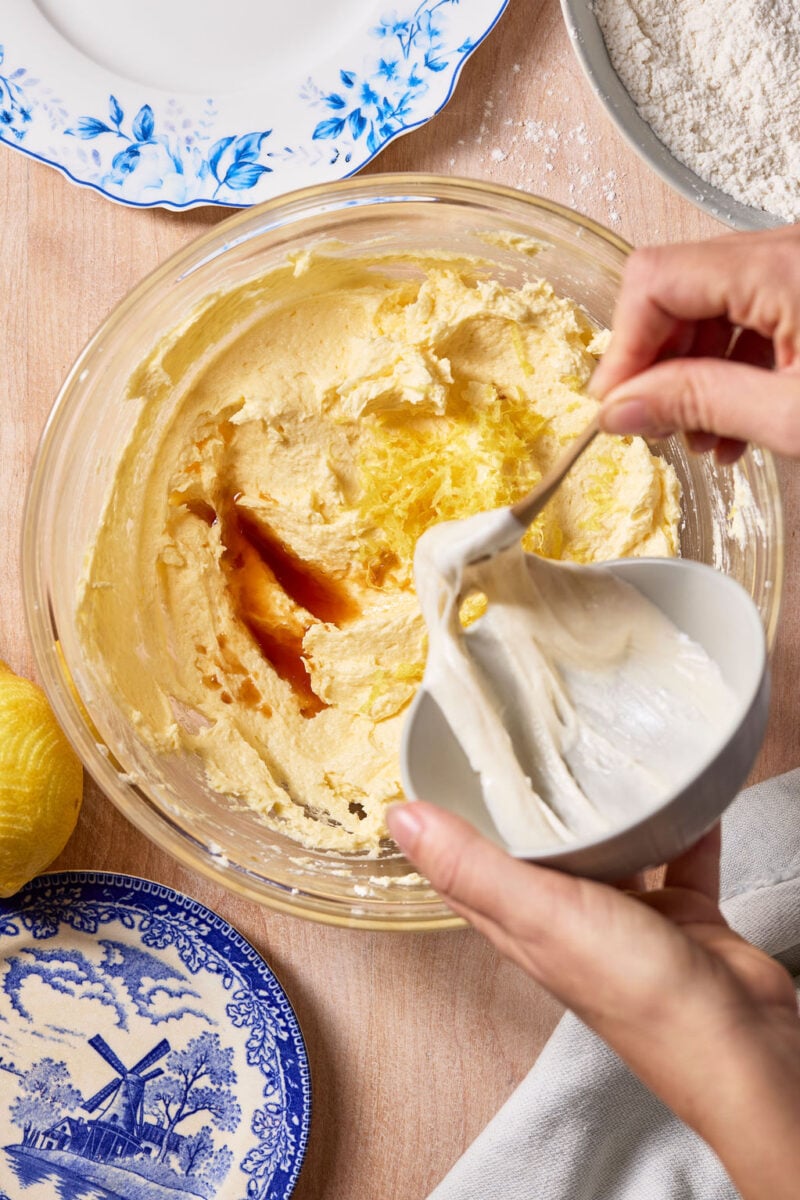 Creamed butter and sugar mixture with eggs, vanilla extract, lemon zest and sourdough starter