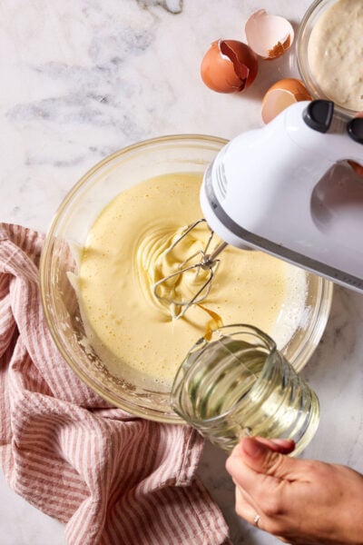 Slow-streamed olive oil in the sourdough cupcake batter.